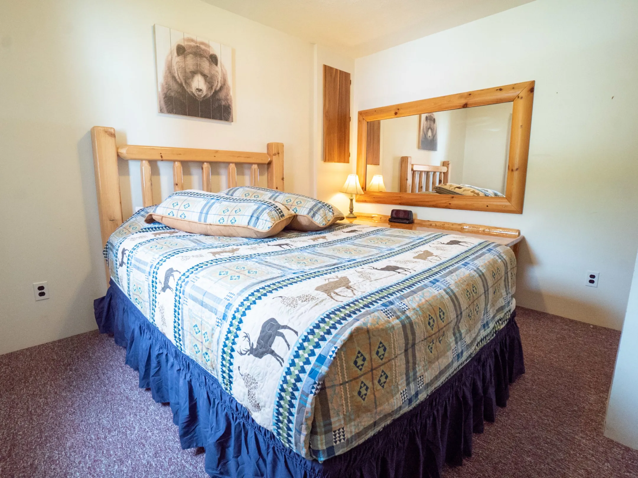 a bedroom with a bed in a room