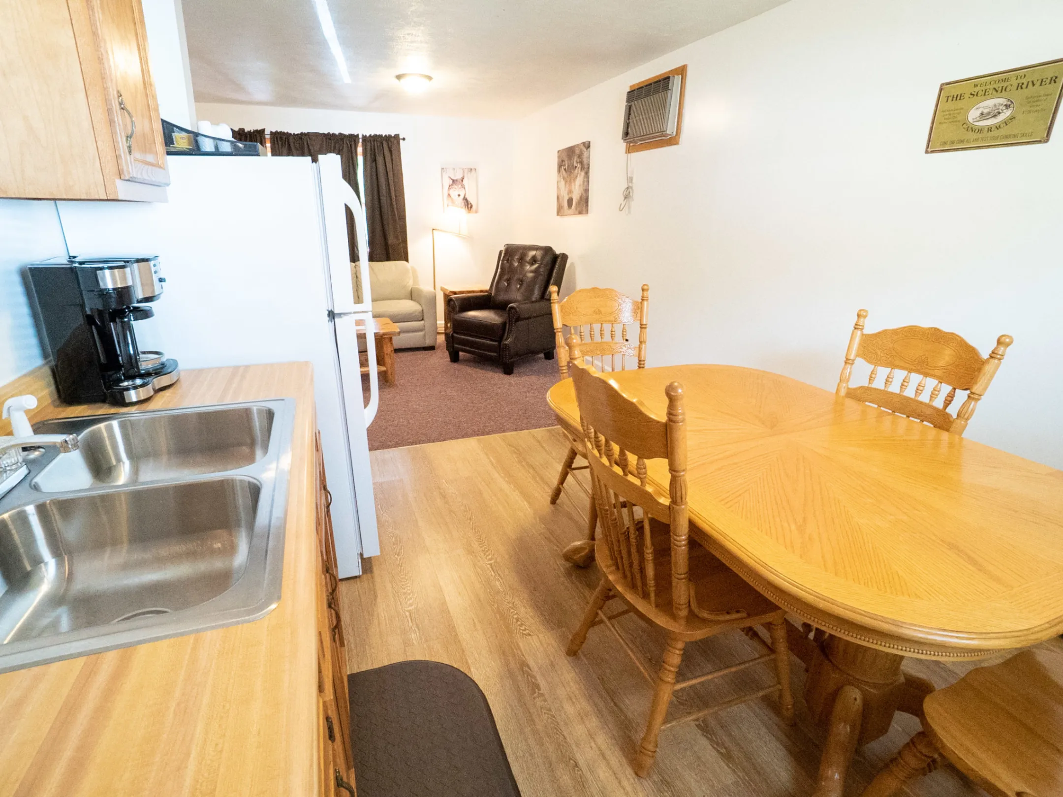 a living room filled with furniture and a table