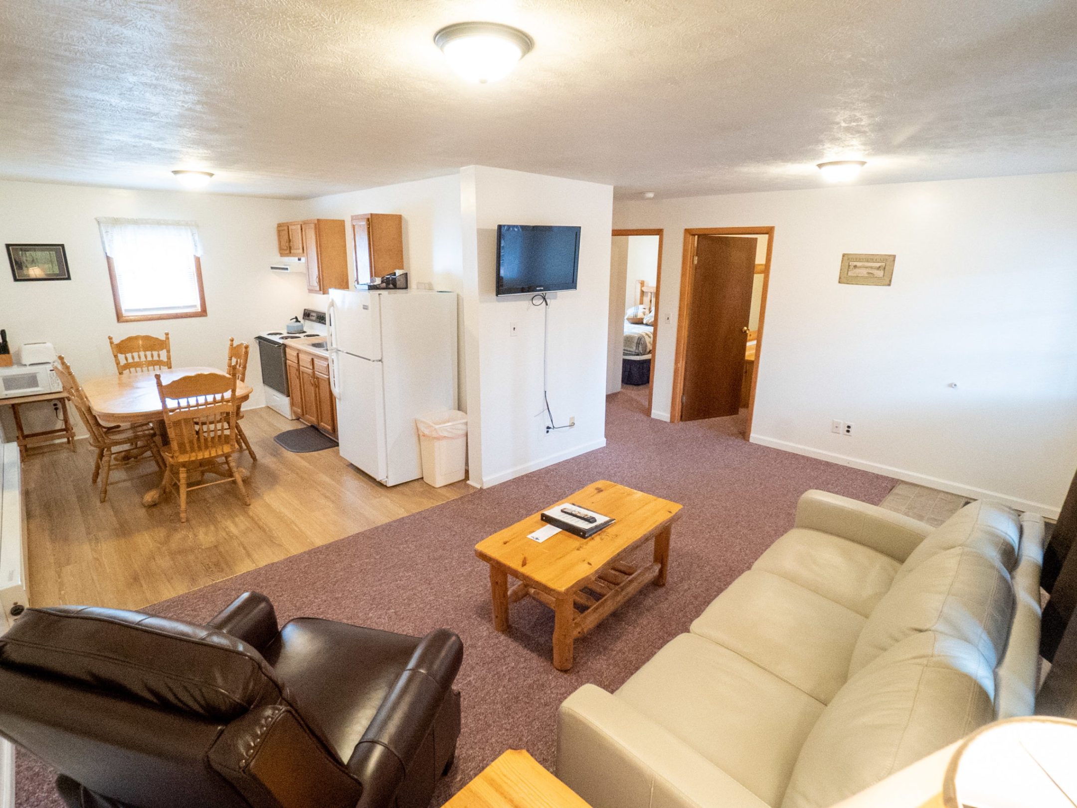 a living room filled with lots of furniture