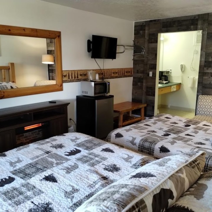 a bedroom with a bed in a room