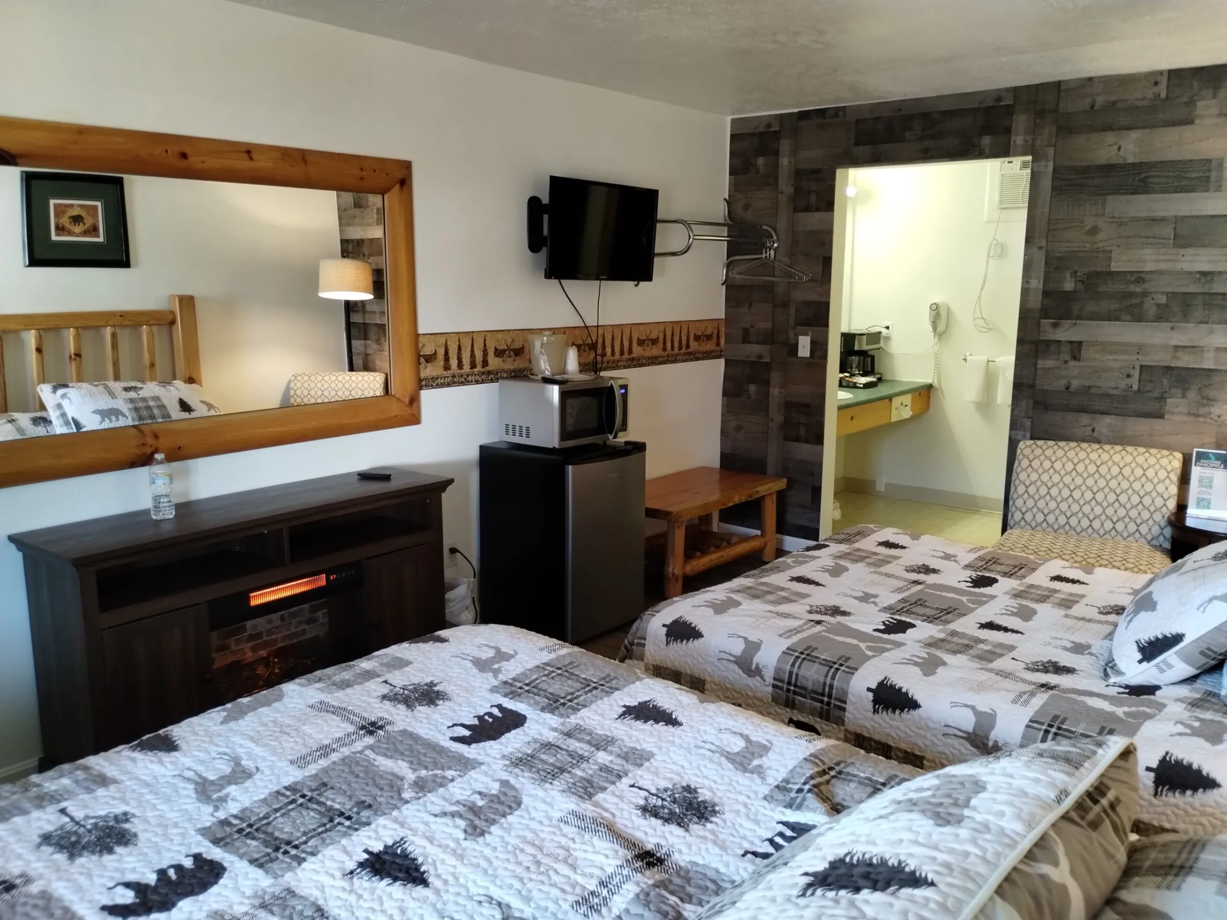 a bedroom with a bed in a room