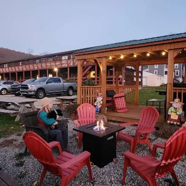 a group of people sitting at a picnic table