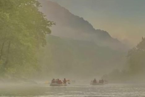 a group of people in a body of water
