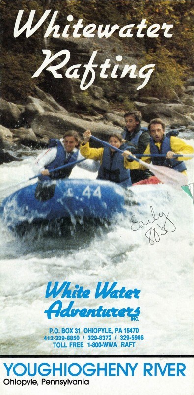 Group rafting on a river, wearing safety gear; text reads 'Whitewater Rafting' and 'Youghiogheny River'.